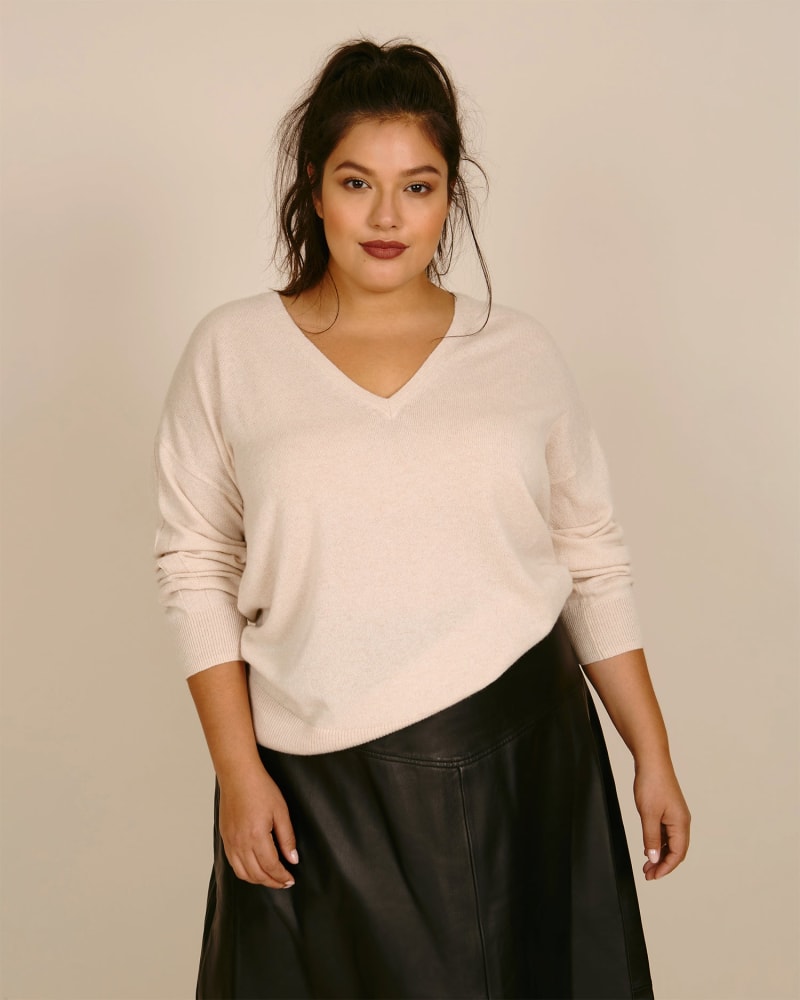 Front of a model wearing a size 0 Cashmere Ava Sweater in Oatmeal by 11 Honoré Collection. | dia_product_style_image_id:224085